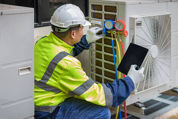 Professional Ac Installation technician working in Woods Hole, MA